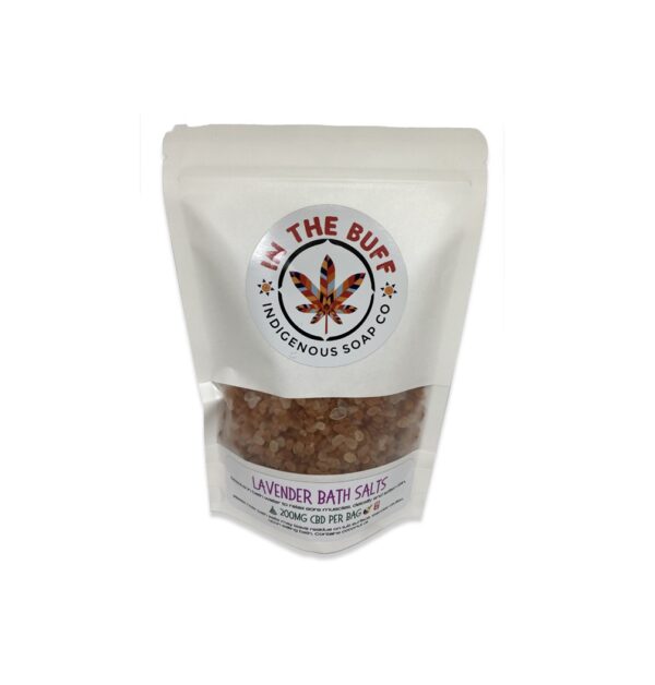 Lavender CBD bath salts in a jar with purple lavender flowers and calming therapeutic spa elements