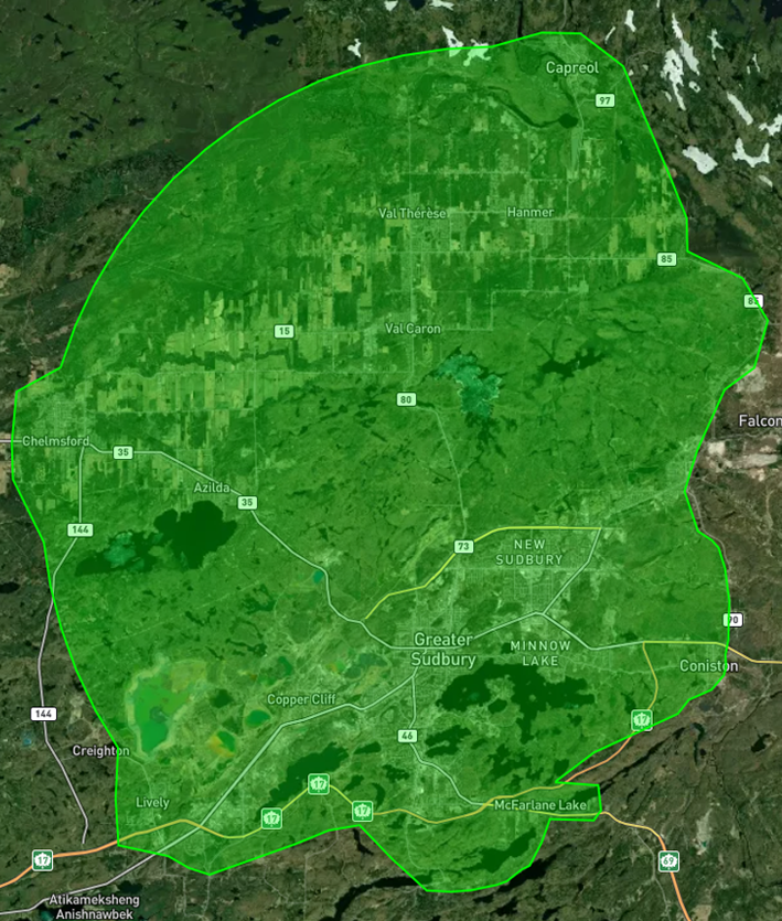 Map highlighting a shaded deliverable service area or coverage zone with boundary markers