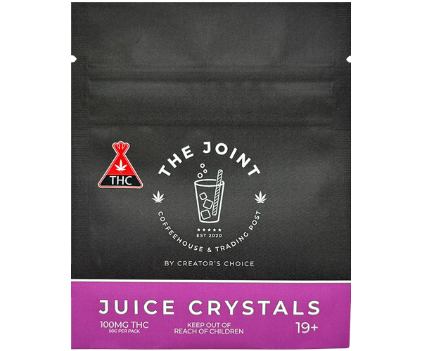 Home juice crystals in a clear container showing vibrant powdered drink mix crystals ready to dissolve