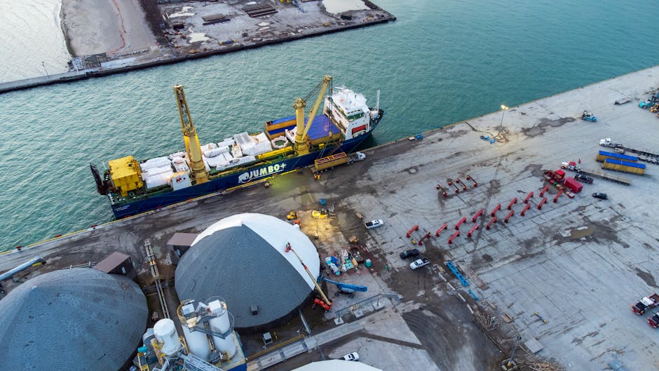 Aerial shot of a cargo ship docked at Oshawa port, Ontario, Canada.