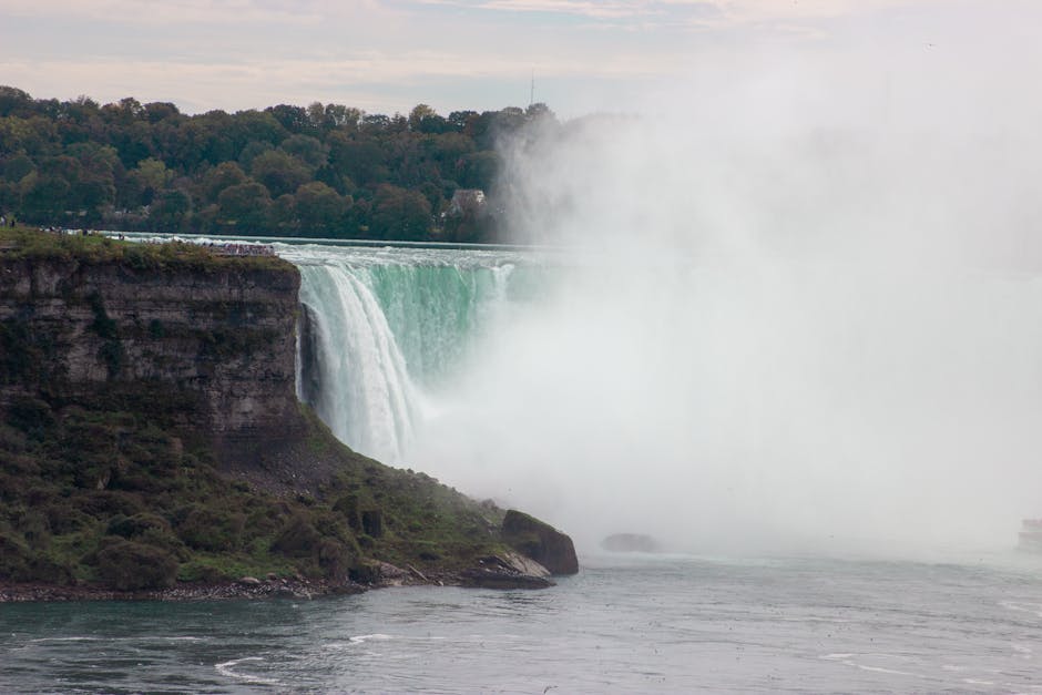 View of Niagara Falls in Canada, showcasing mist and natural beauty.